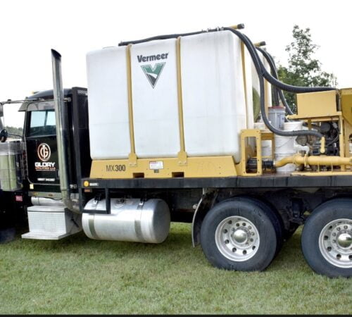Glory Utilities LLC semi with mixer including Glory’s logo on it.