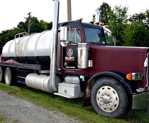 Glory Utilities LLC mud vac with logo on it