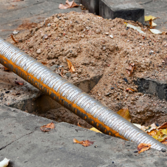 drilling underneath walkway