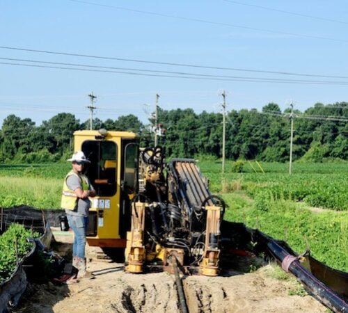 Directional drill setup, the drill is set in a Silt Fence containment, to prevent any drill fluids or equipment from getting into farmers' field 